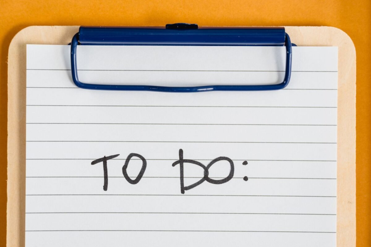Ending Failed Probation: How Can Employers Terminate Lawfully? 4 Hand ticking a checklist on white paper