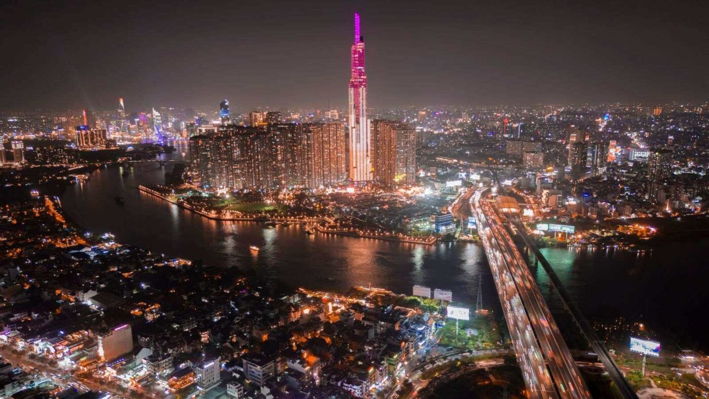 Apprenticeships: Rights and Obligations of Training Enterprises 3 Aerial view of Ho Chi Minh City skyline at night