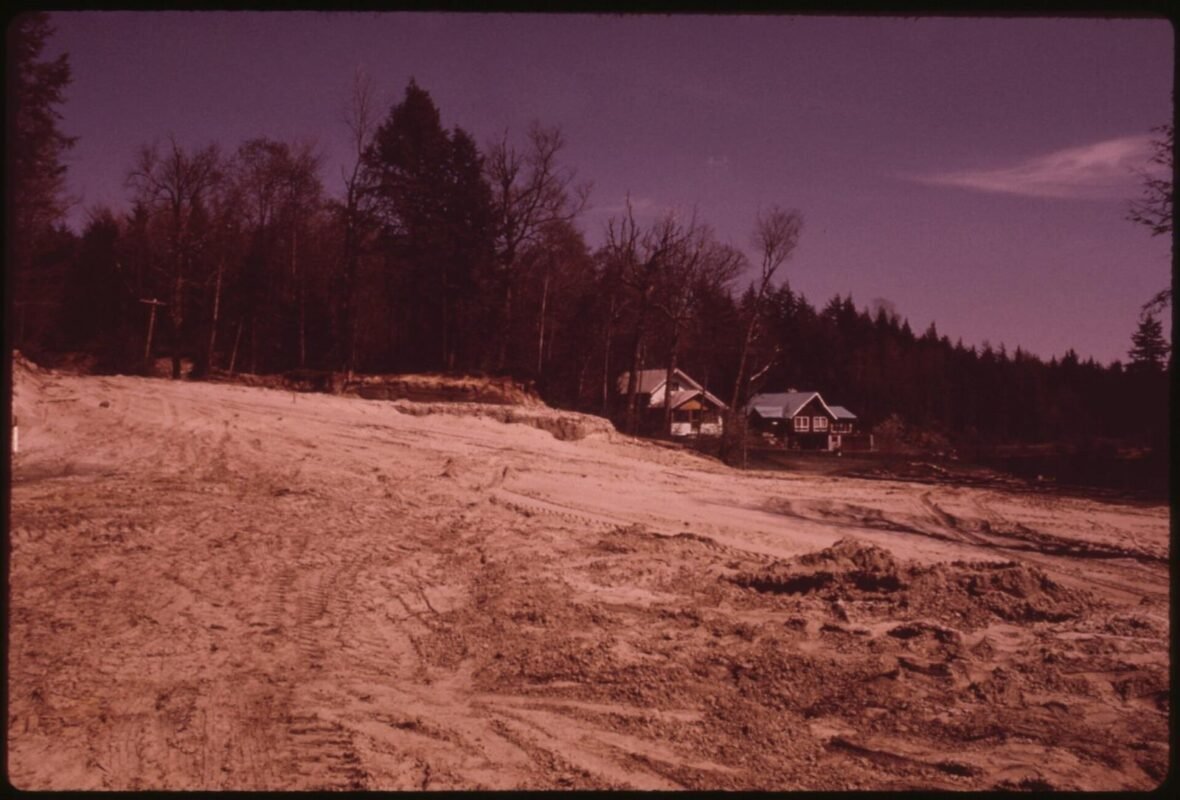 Bulldozer leveling ground — site clearance