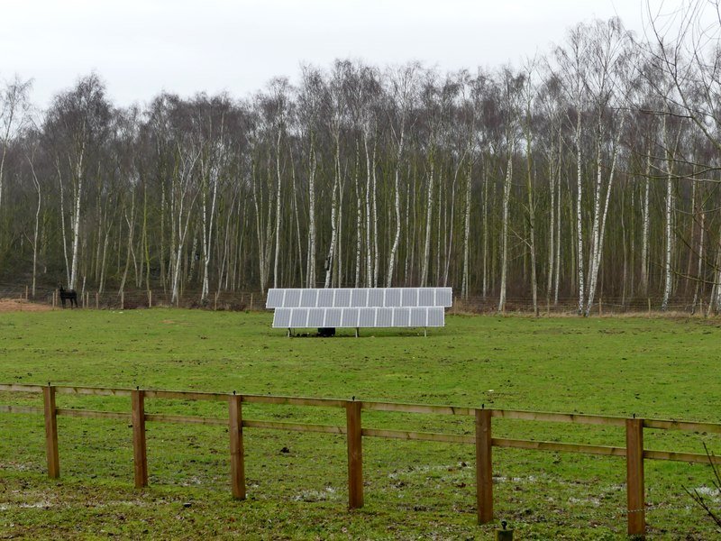 Solar panels in a field — illustrating agrivoltaics