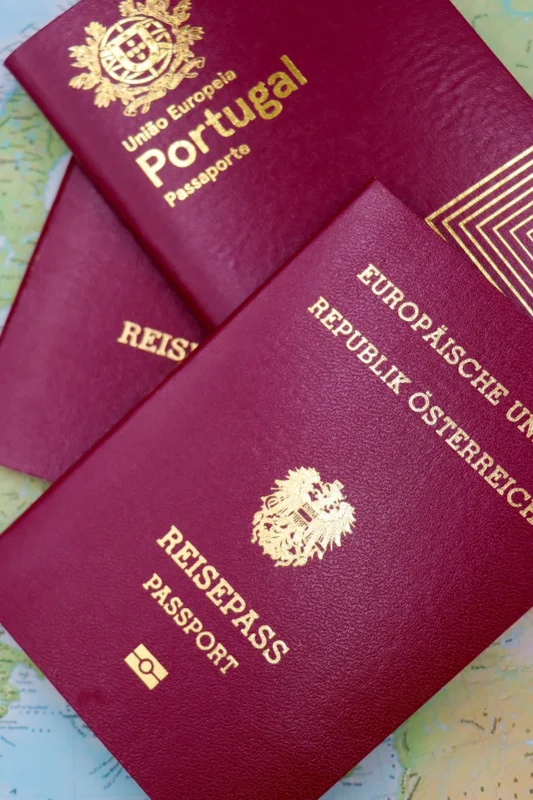 Passports on a map — illustrating dual-nationality investors