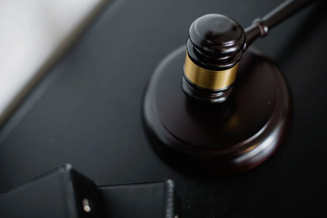 Close-up of a wooden gavel — illustrating land use rights auctions