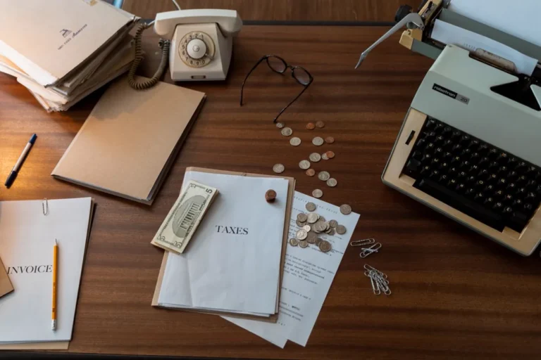 Workspace with documents on a wooden table