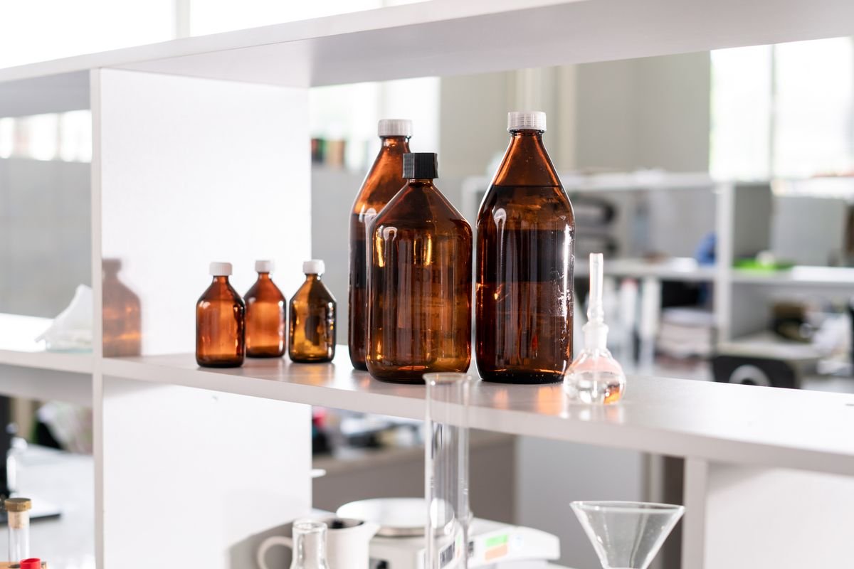 Pharma M and A in Vietnam: drug licences — medicine bottles in a laboratory illustration
