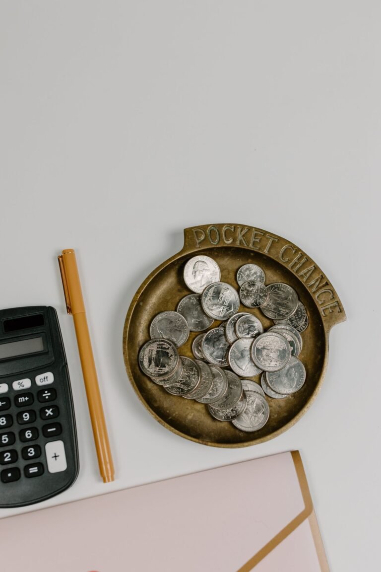 Calculator and financial documents on a desk — illustrating severance cost budgeting