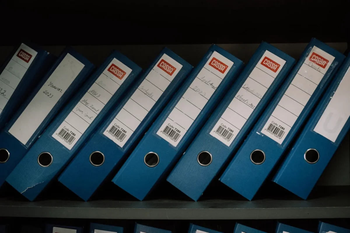 Office binders on shelves — illustrating accounting records retention