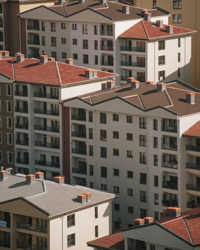 Modern apartment buildings — illustration for the article on apartment sale contracts in Vietnam and mandatory clauses under the 2023 Housing Law