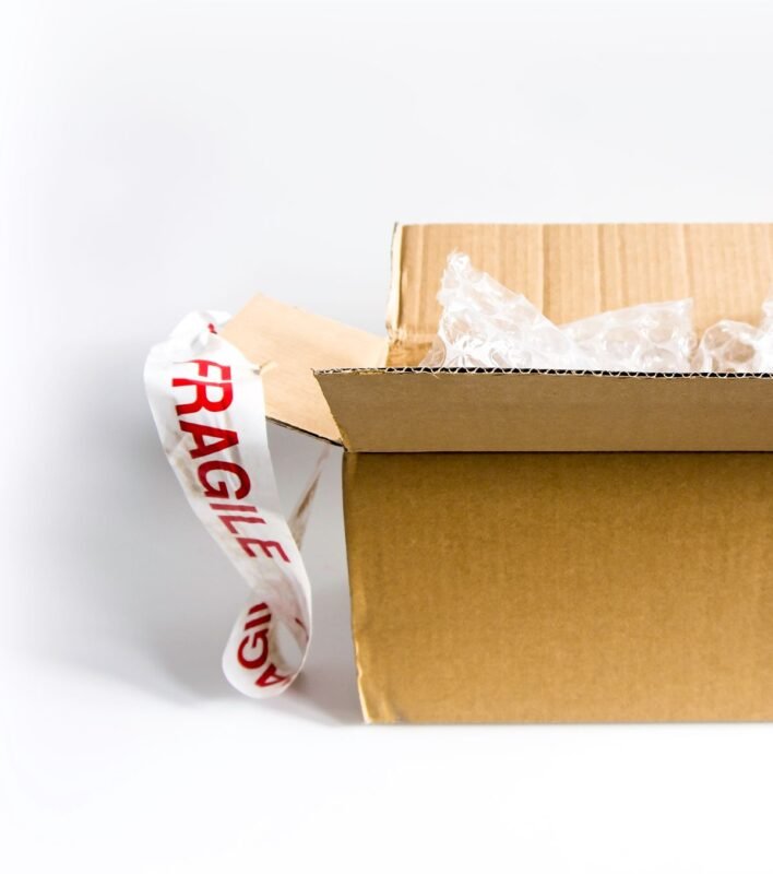Layoff due to restructuring — packed moving boxes
