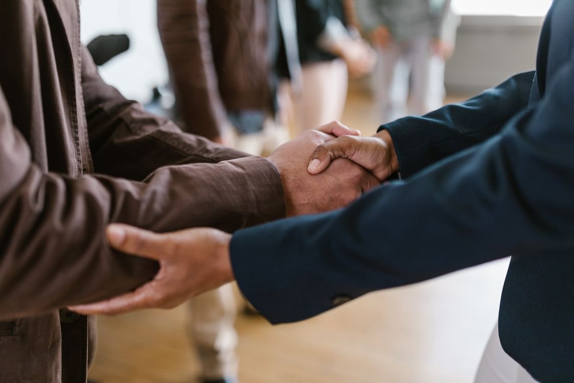 Loan agreement between parent company and subsidiary — business handshake