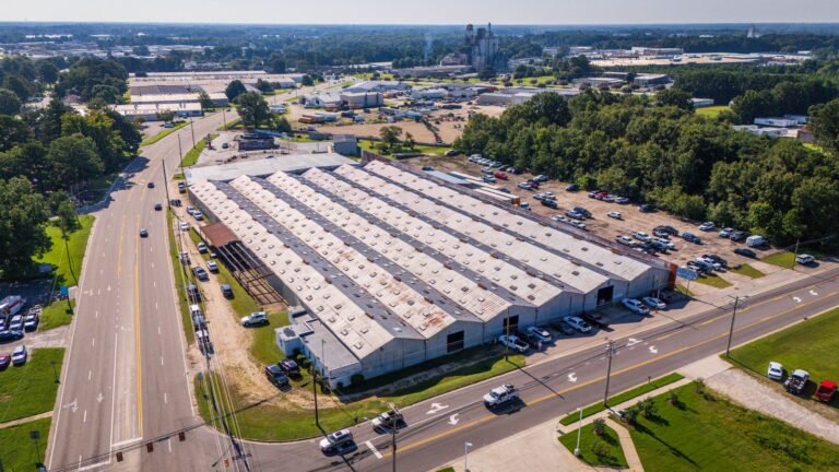Aerial photo of an industrial area with warehouses in bright daylight