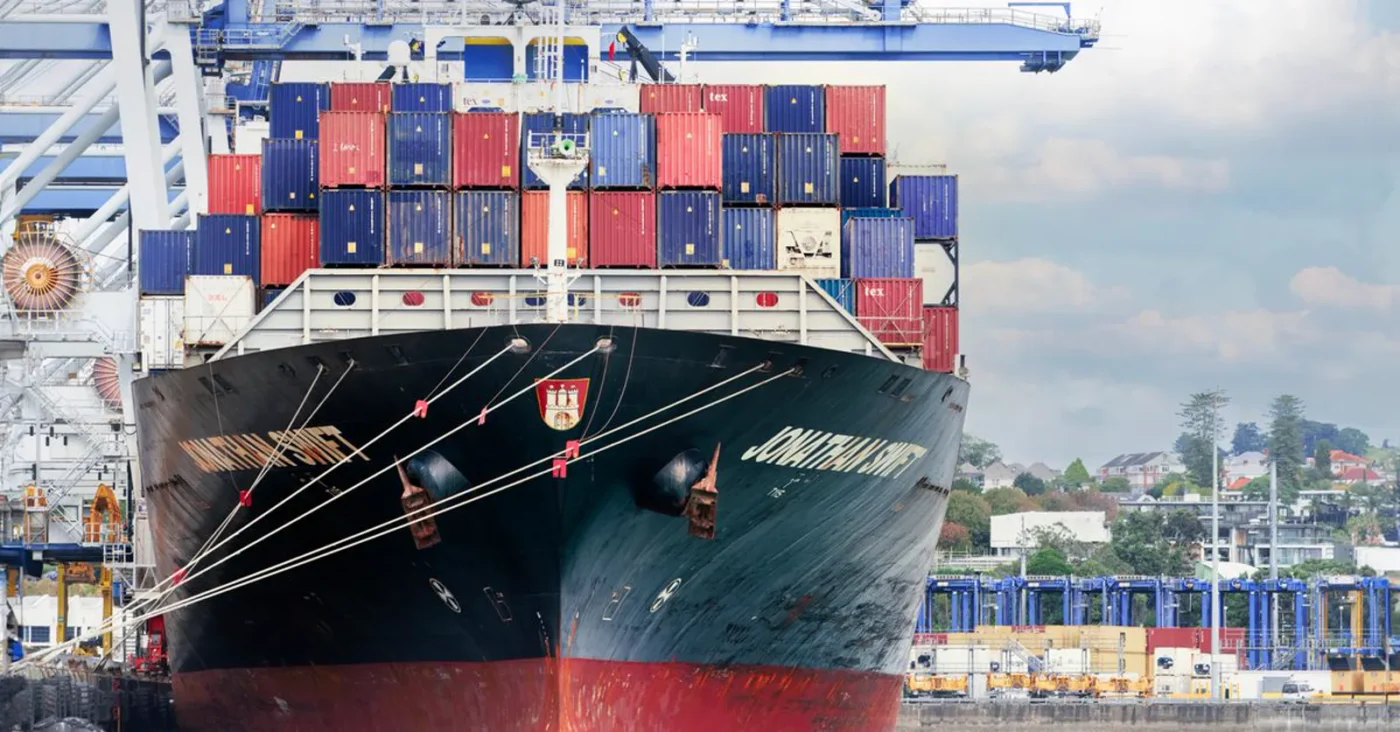 Container cargo ship at port — is there a minimum charter capital for FDI companies in Vietnam?