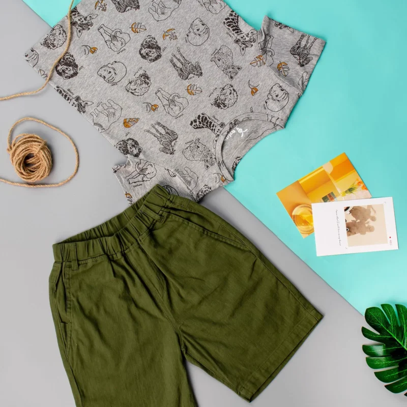 Intercountry Adoption in Vietnam: Full Cost Breakdown (Fees + Ancillary Costs) 1 Children's clothes flatlay and calculator — full cost breakdown of intercountry adoption in Vietnam