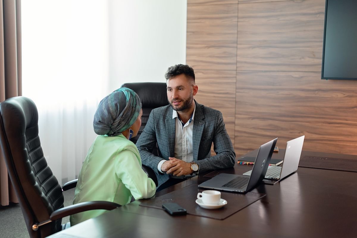 Two professionals discussing business strategy