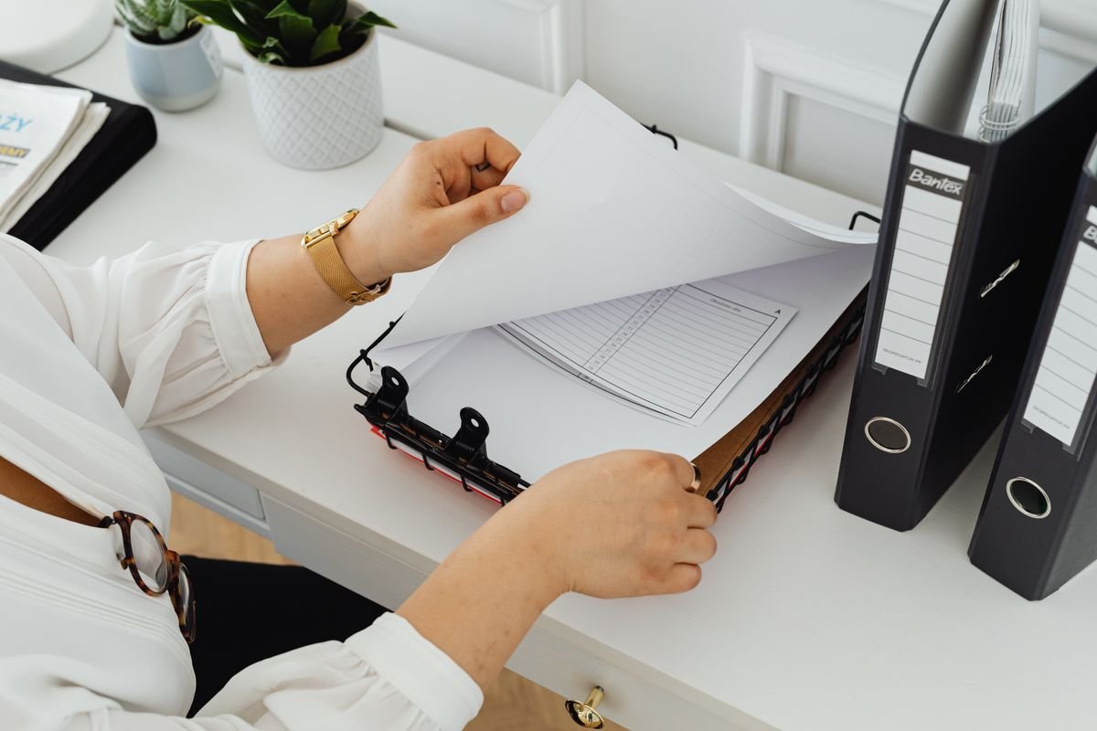 Ending Failed Probation: How Can Employers Terminate Lawfully? 2 Office desk with probation paperwork