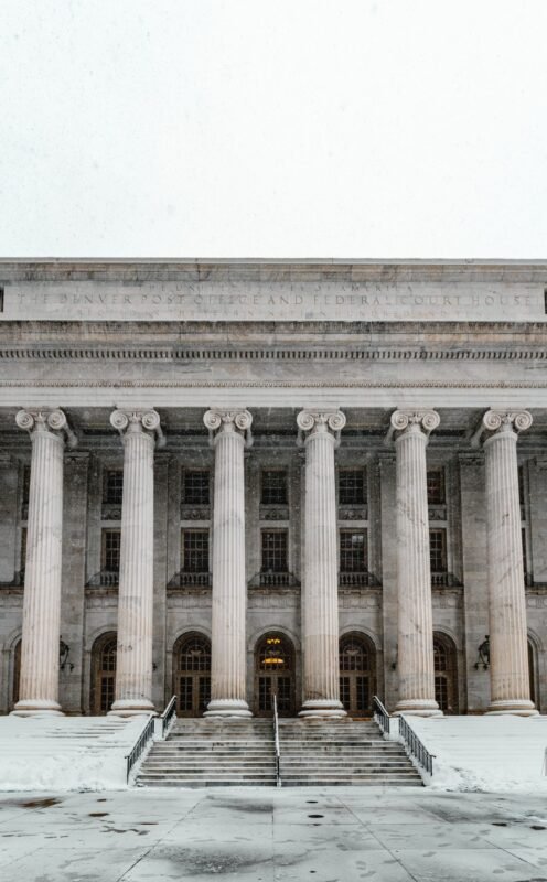 When Can a Commercial Legal Entity Be Suspended from Operations in Vietnam? 2 Courthouse with majestic columns