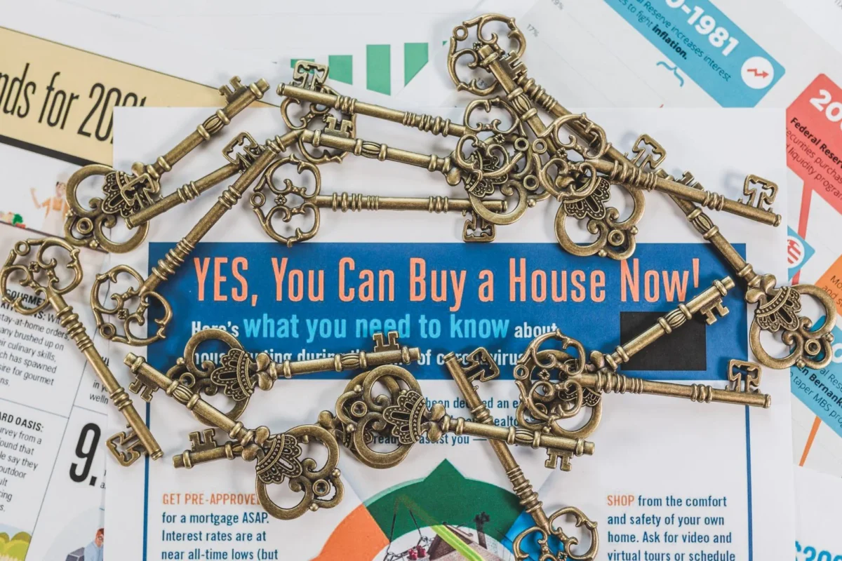 Keys spread over real estate documents