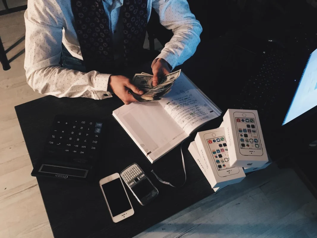 Calculator and tax documents — illustrating corporate income tax finalization