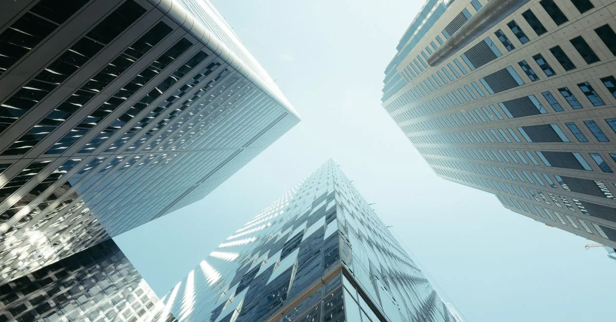 Foreign JV Partner Fails to Contribute Committed Capital: Remedies for Other Partners 1 Office towers — illustrating a foreign JV partner failing to contribute capital