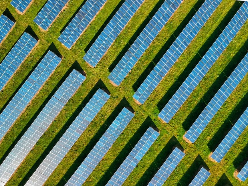 Aerial view of solar panel arrays — illustrating renewable energy projects eligible for import tax incentives