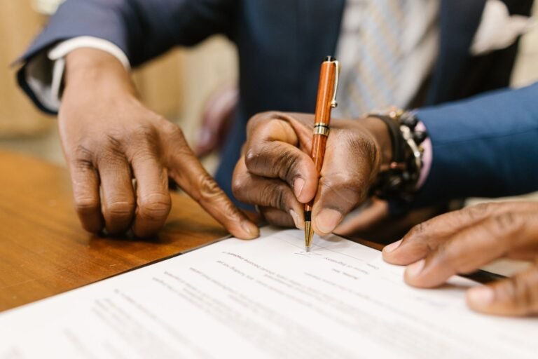 Vietnam investor visas DT1–DT4 — hands signing business documents