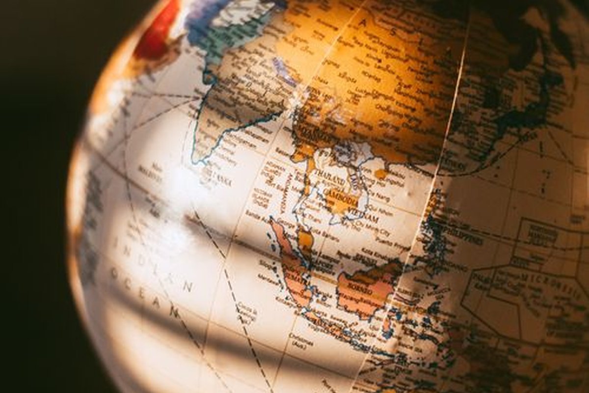 Bilateral Visa Waivers: Which Nationalities Enter Vietnam Visa-Free? 1 Vintage world globe in warm light