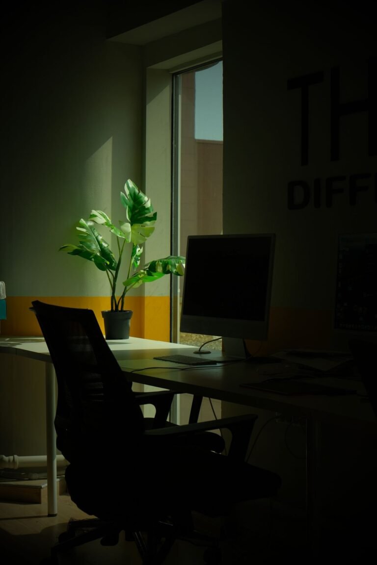 Empty office workspace at dusk — illustrating Tet bonus dispute prevention at Chinese-invested companies, no people