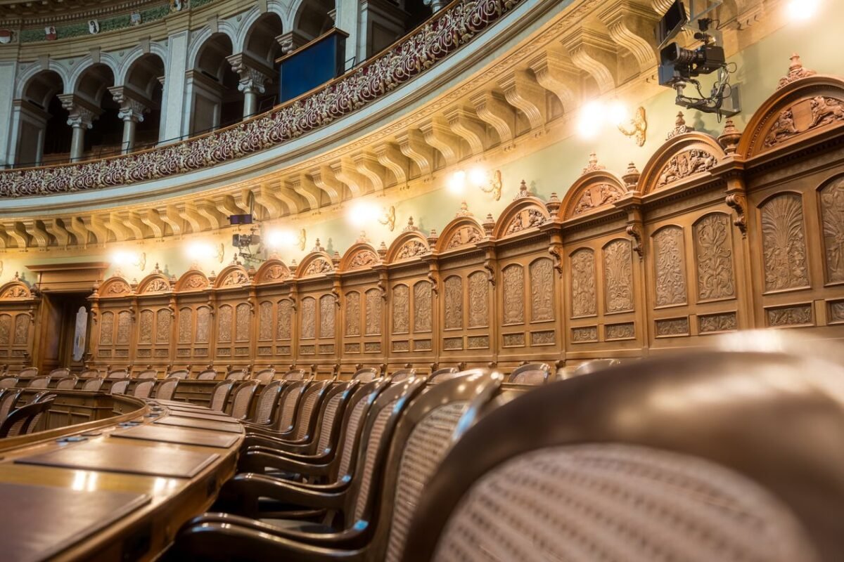 Courtroom interior — project duration and extension of investment projects