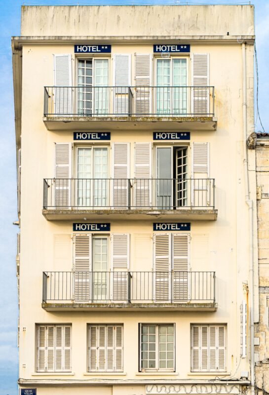 Security and Order Certificate for Hotels and Guesthouses in Vietnam: Dossier and Timeline 1 Hotel building facade with HOTEL signage — illustrating dossier and timeline for the Security and Order Certificate for hotels and guesthouses
