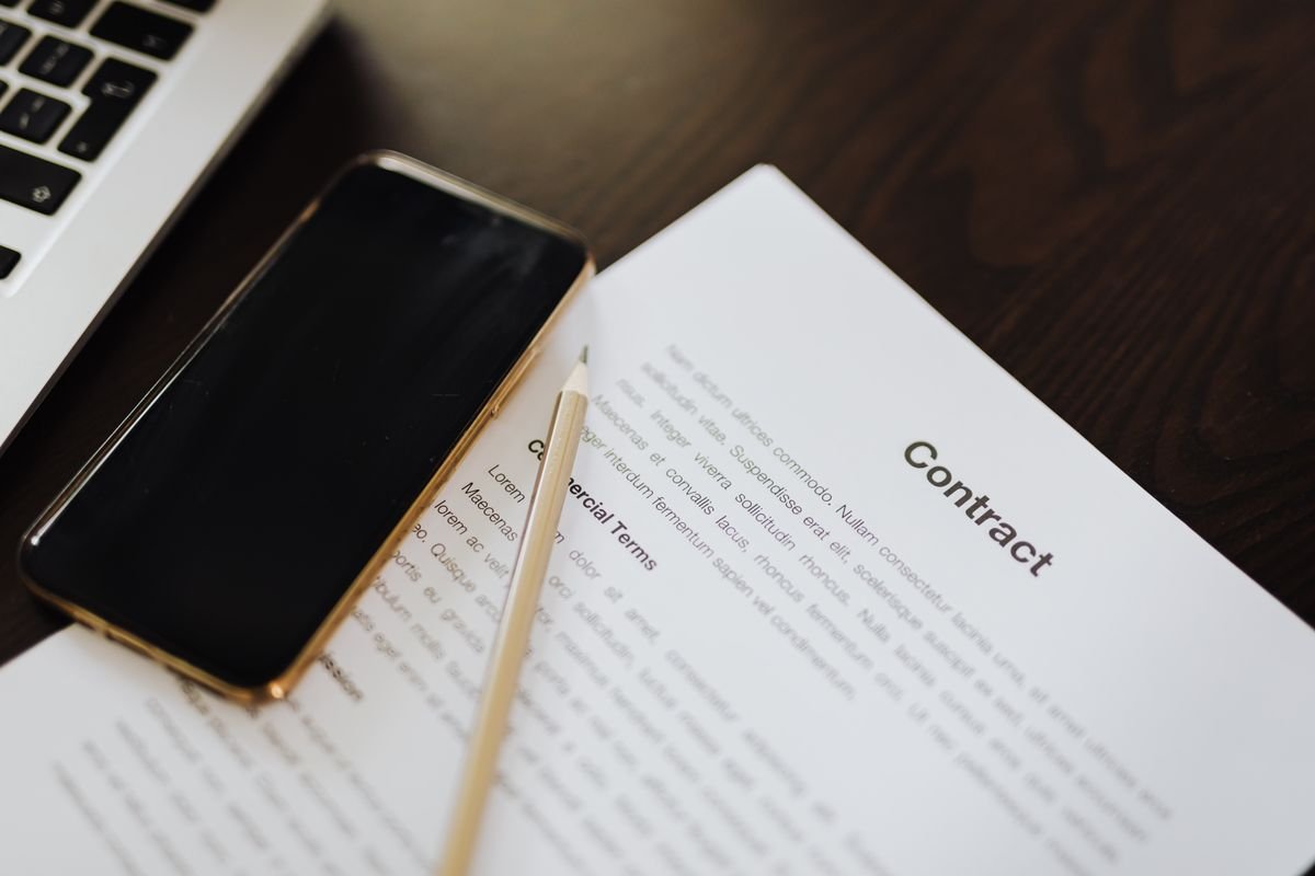 Contract and business documents illustrating an article on IP registration priority for new foreign investors