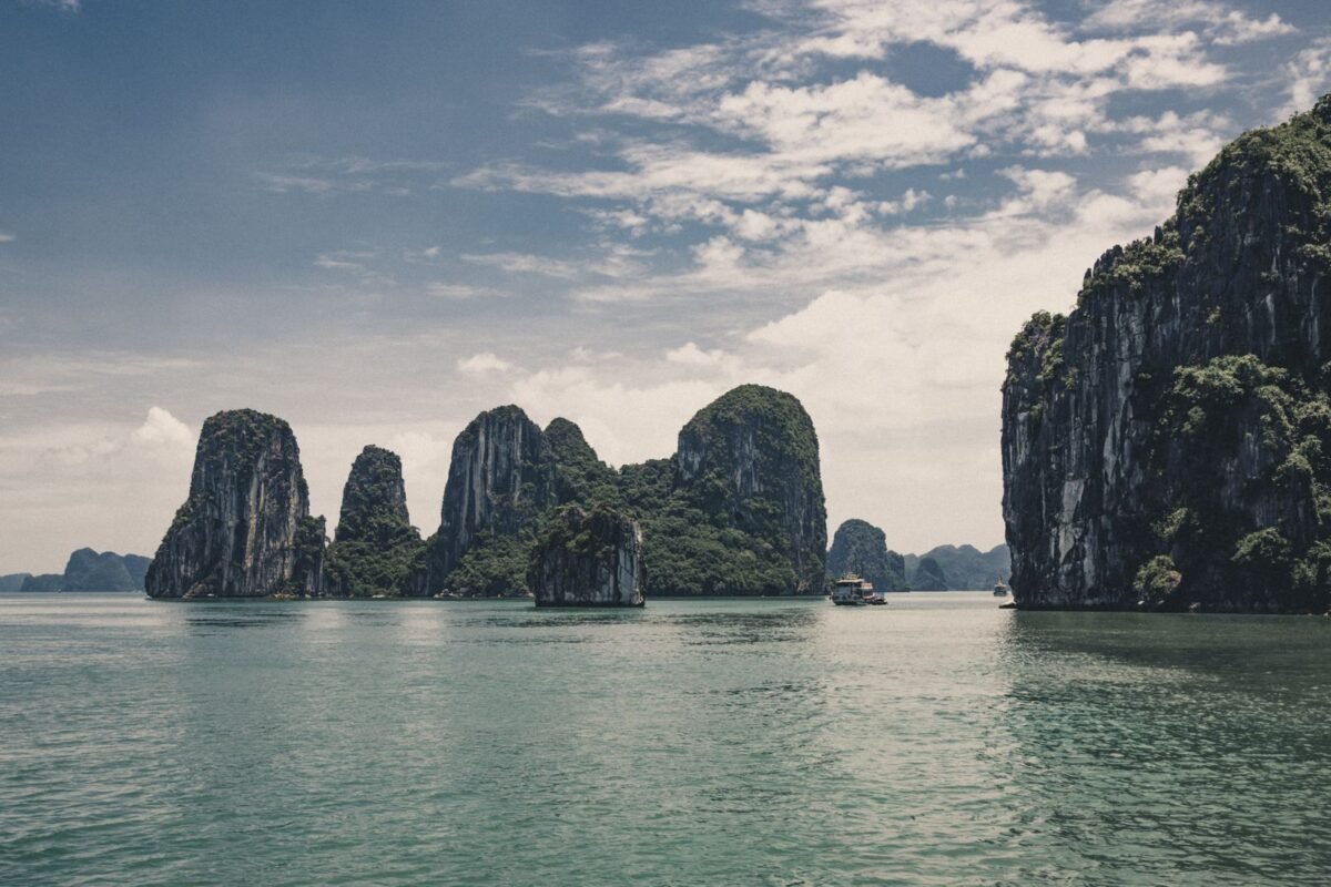 Rock formation islands in Ha Long Bay, Vietnam — do foreign children under 14 need separate temporary residence declarations