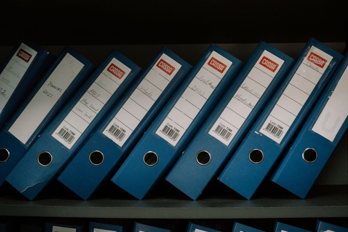 Hands holding financial documents