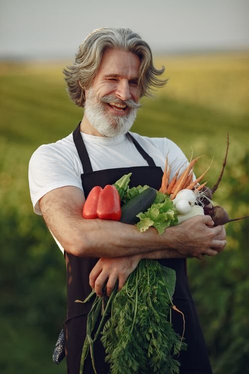Farmers harvesting produce for the food processing supply chain