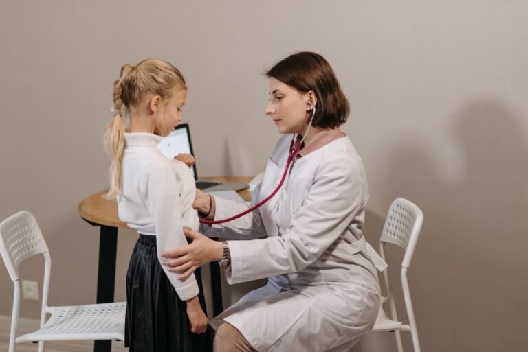Doctor examining patient — illustrating health certificate requirements for work permits