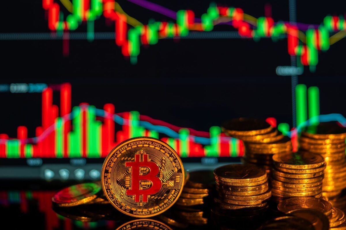 Golden Bitcoin with financial growth graphs, showcasing cryptocurrency market trends