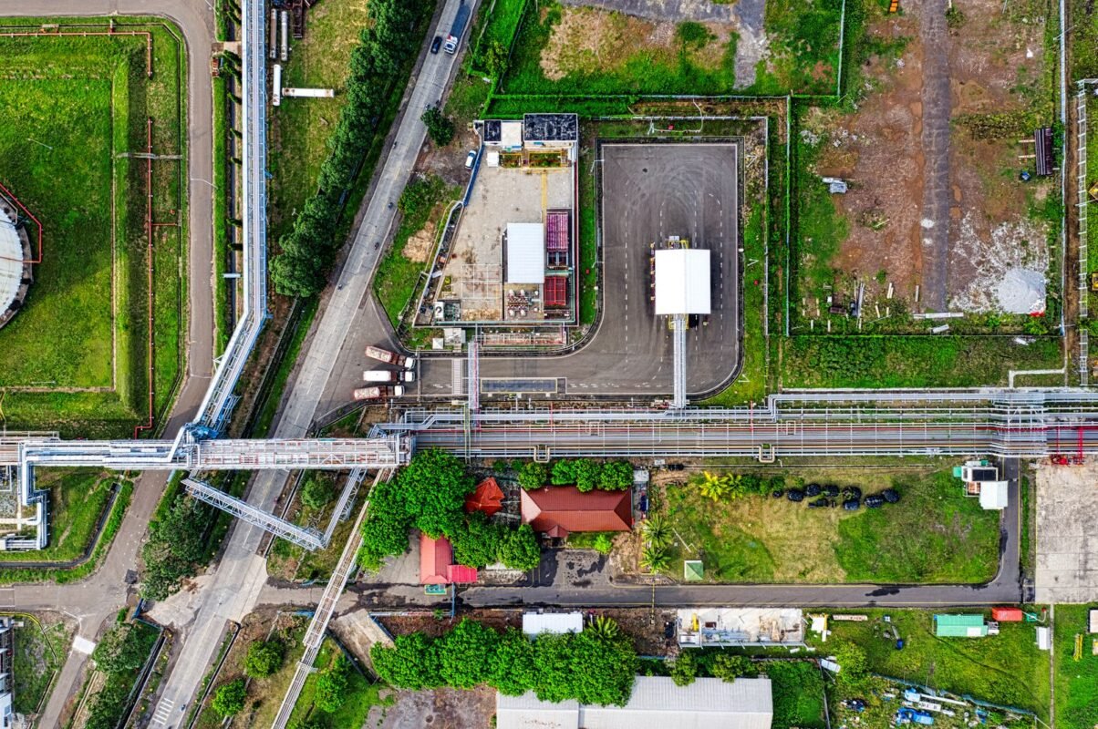 Land Rent for Service and Commercial Land Inside Industrial Parks in Vietnam (Banks, Canteens): Different From Production Land 1 Aerial photograph capturing an industrial area layout in Banten, Indonesia, featuring buildings and roads