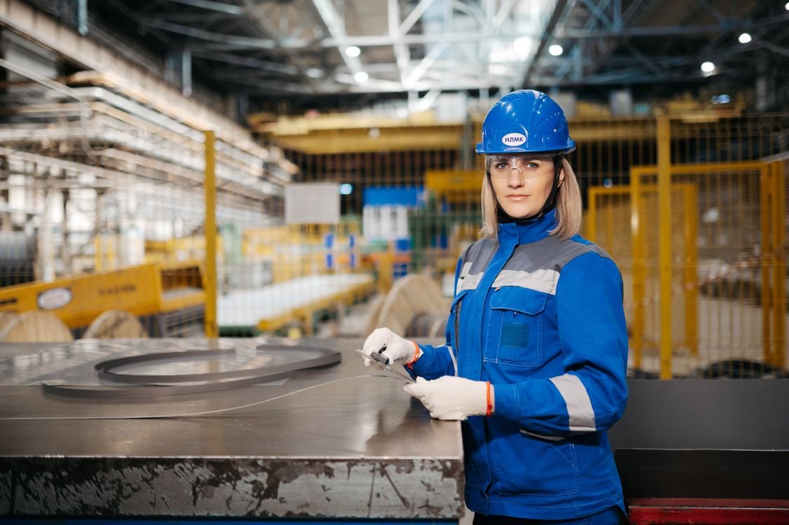 Professional female engineer working in a modern industrial facility