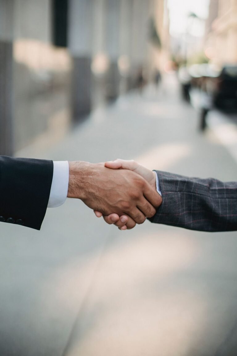 Handshake deal — illustrating risks of taking inheritance-disputed land