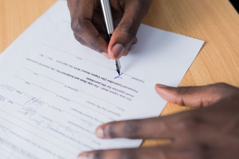 Signing a work permit application dossier for a foreign worker in Vietnam