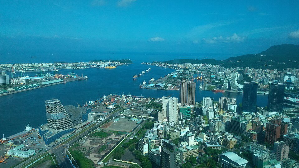 Aerial view of seaport and city — illustrating key economic regions
