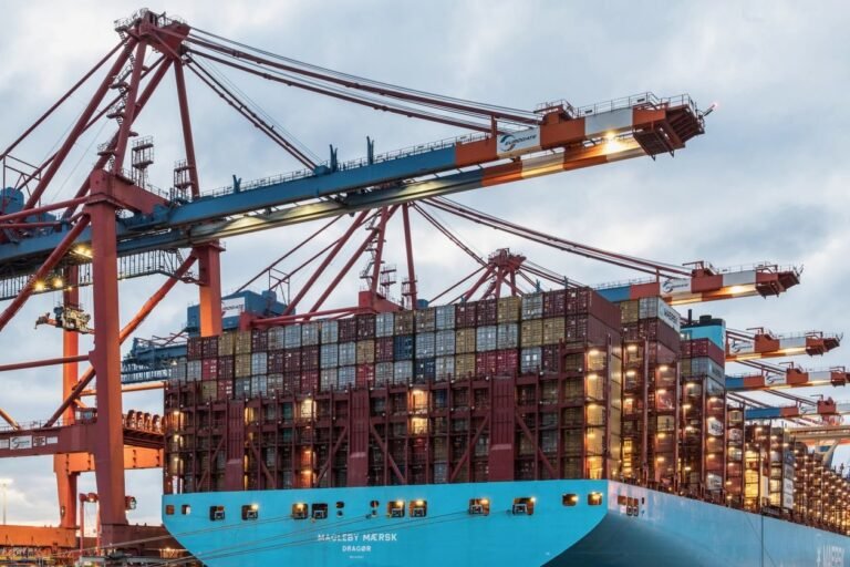 Container cranes at a port, illustrating the Hong Kong vs Vietnam overtime limits comparison for 3-shift factories