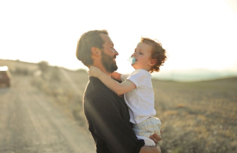 Father and son at sunset