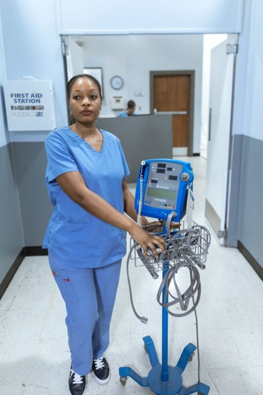 Female nurse in blue scrubsuit