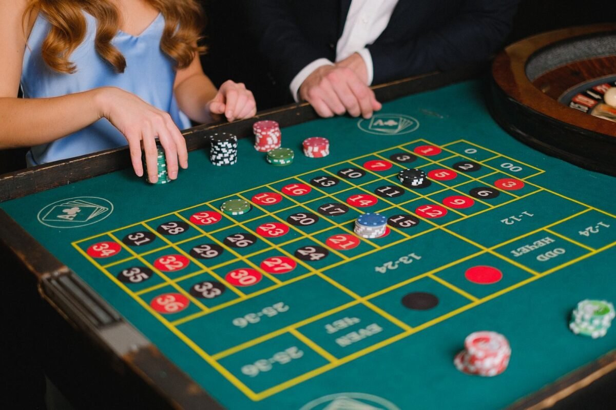 Person holding casino chips
