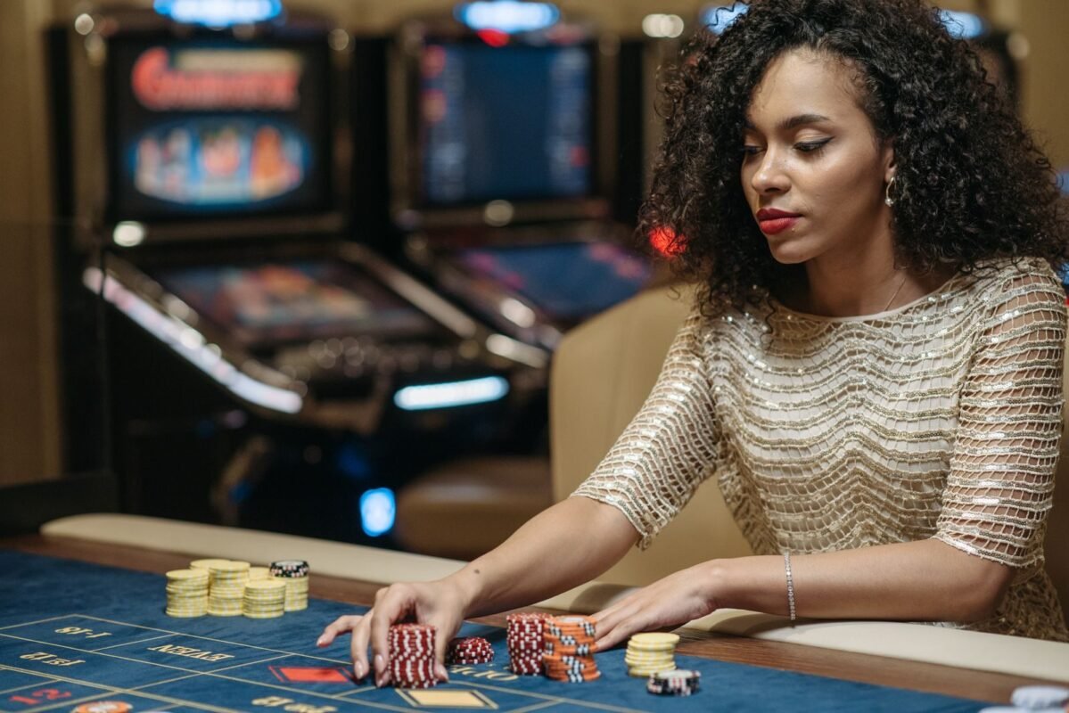Woman betting chips on a gaming table