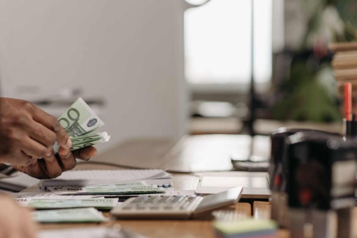 Person counting paper money