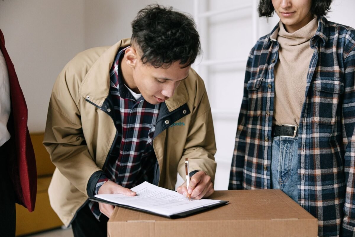 Man signing papers