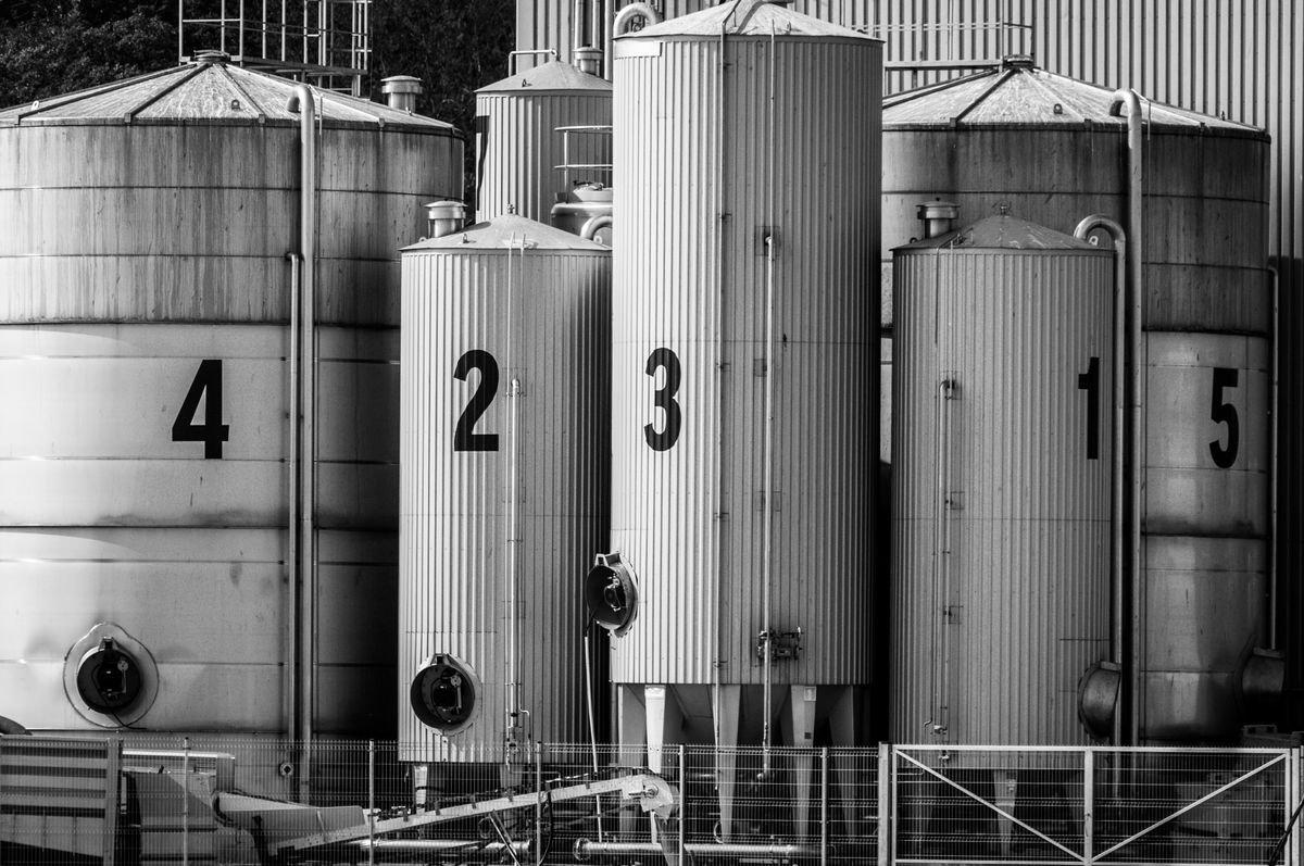 Monochrome Industrial Silos with Bold Numbers