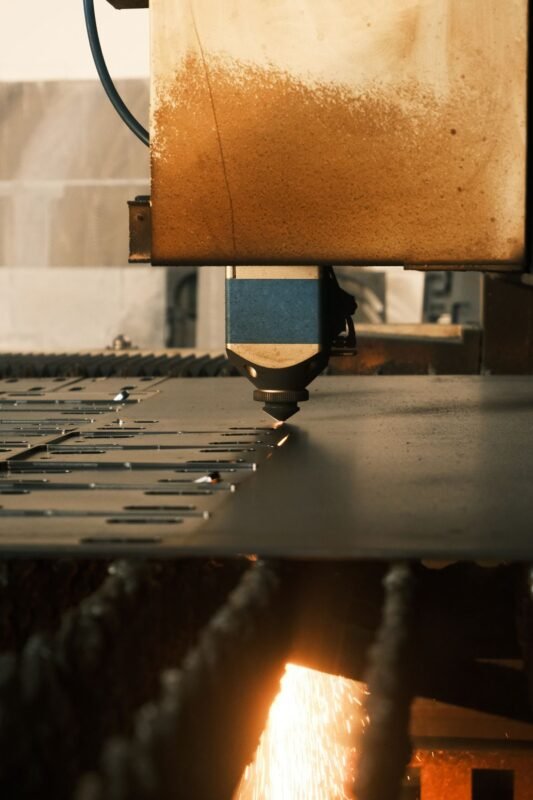 Industrial Laser Cutter Operating in Factory