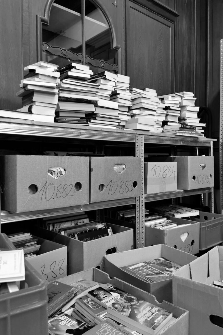 Archive shelves with numbered document boxes — illustrating missing audit records and evidence