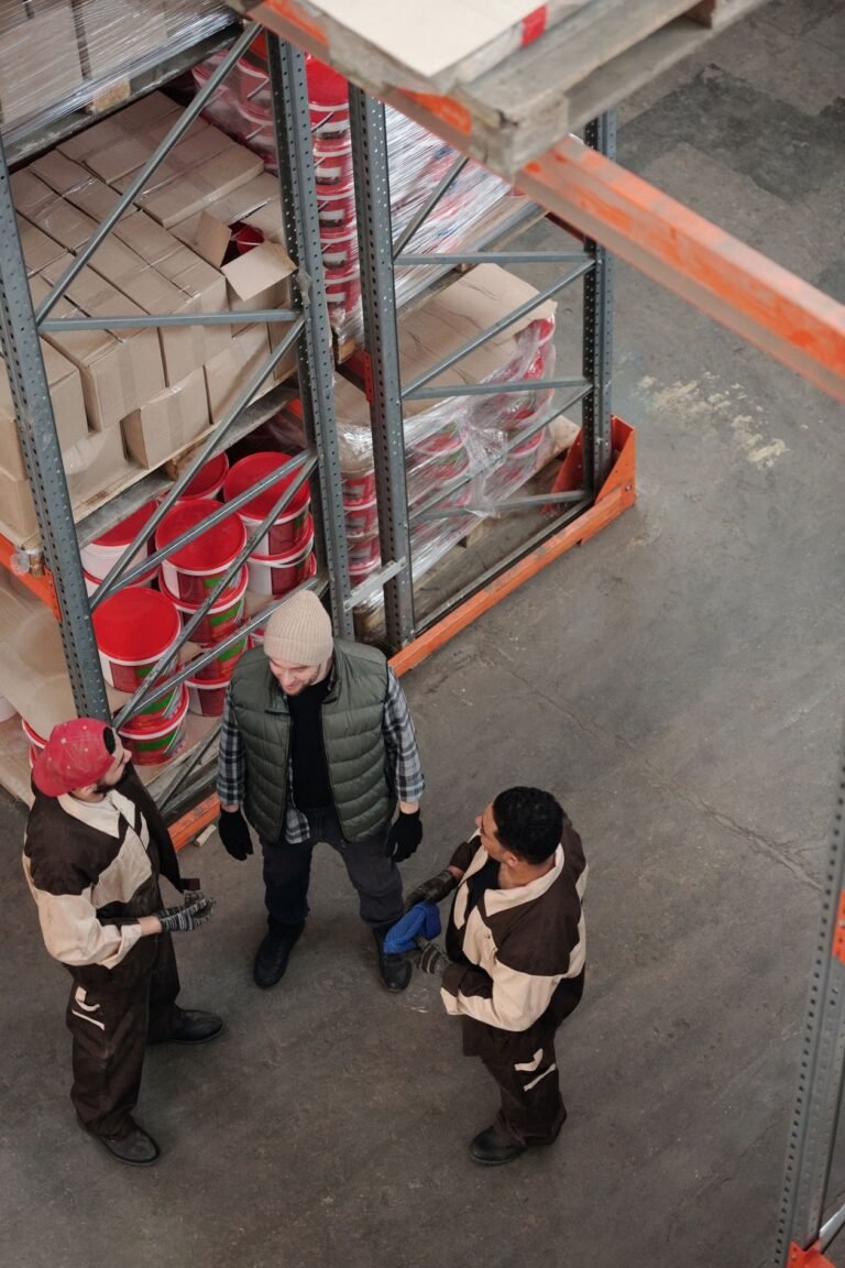 Warehouse workers at work, illustrating the Indonesia vs Vietnam severance comparison for workforce reductions